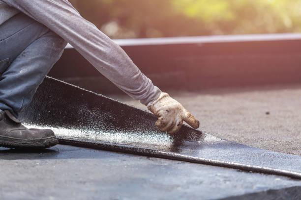 Professional Basement Waterproofing technician working in Auburn, NY